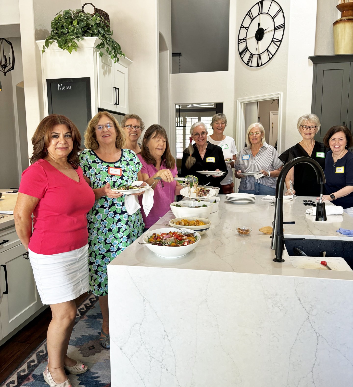 Home party kitchen gathering with women