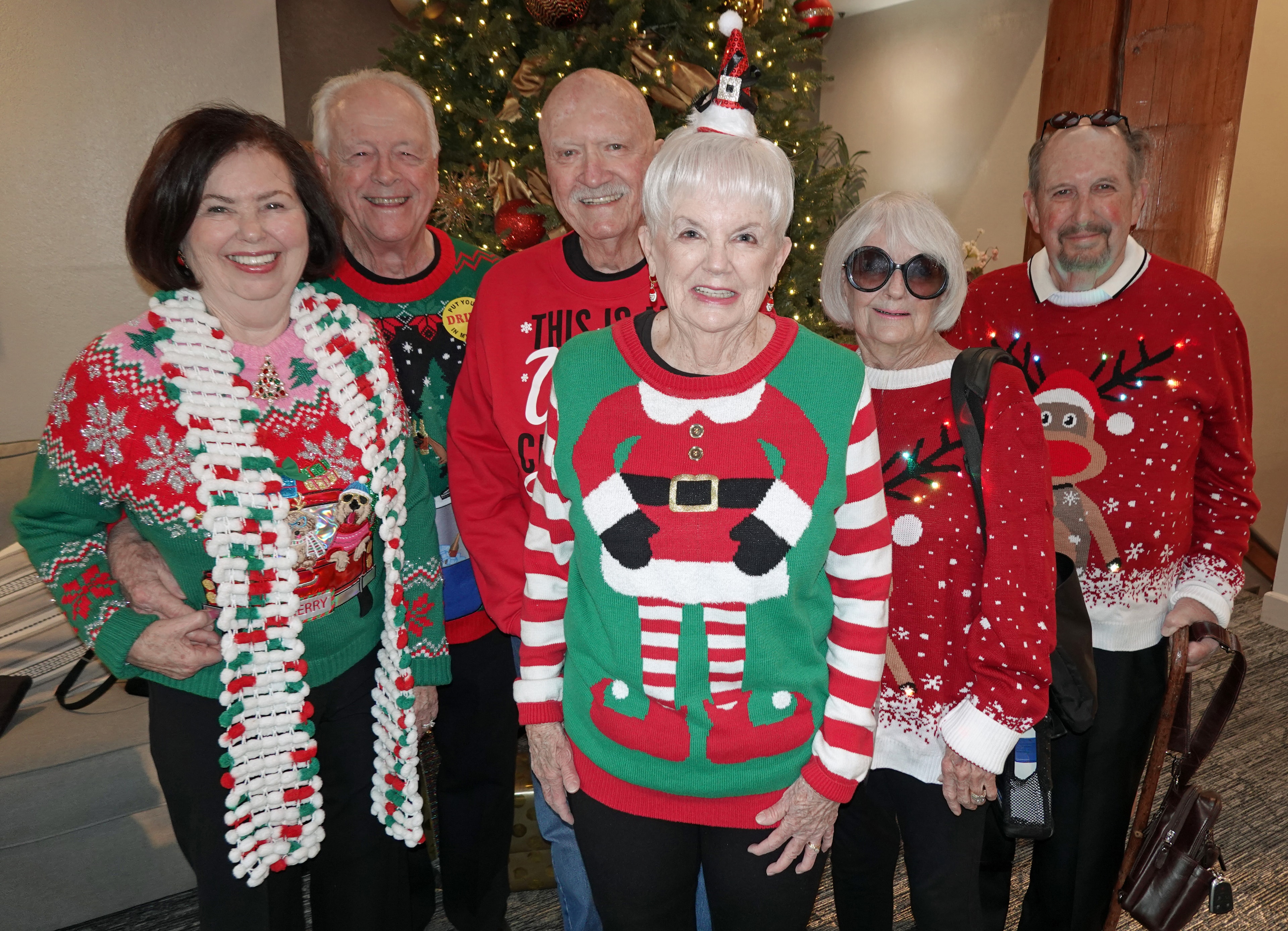 Holiday ugly sweater party group